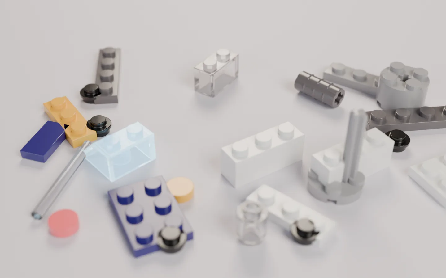 Loose brick parts scattered on a bench: plates, a slope, round tiles, an axle and clear pieces.