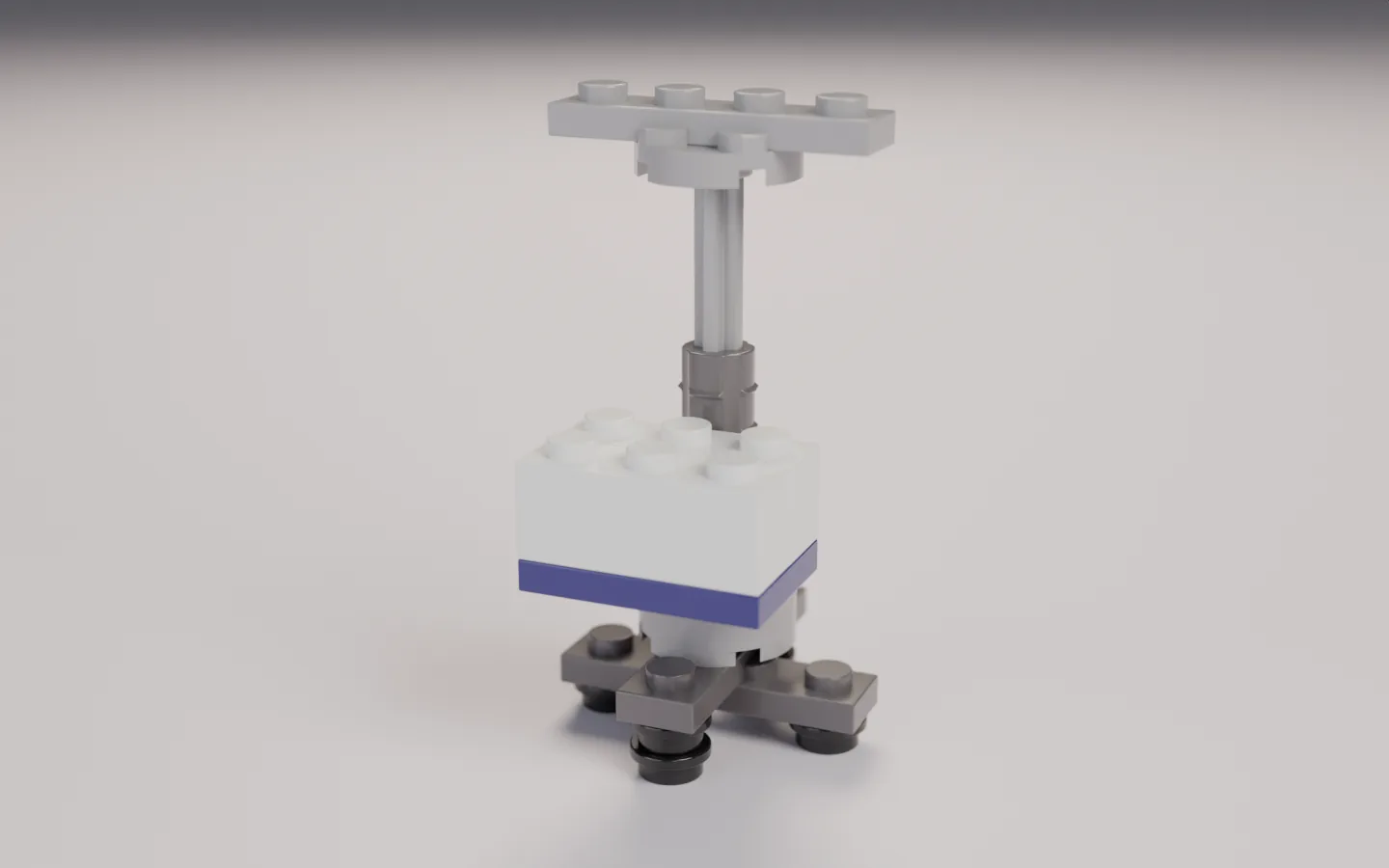 A pump half built from bricks: rolling base, pole and the first white body bricks.